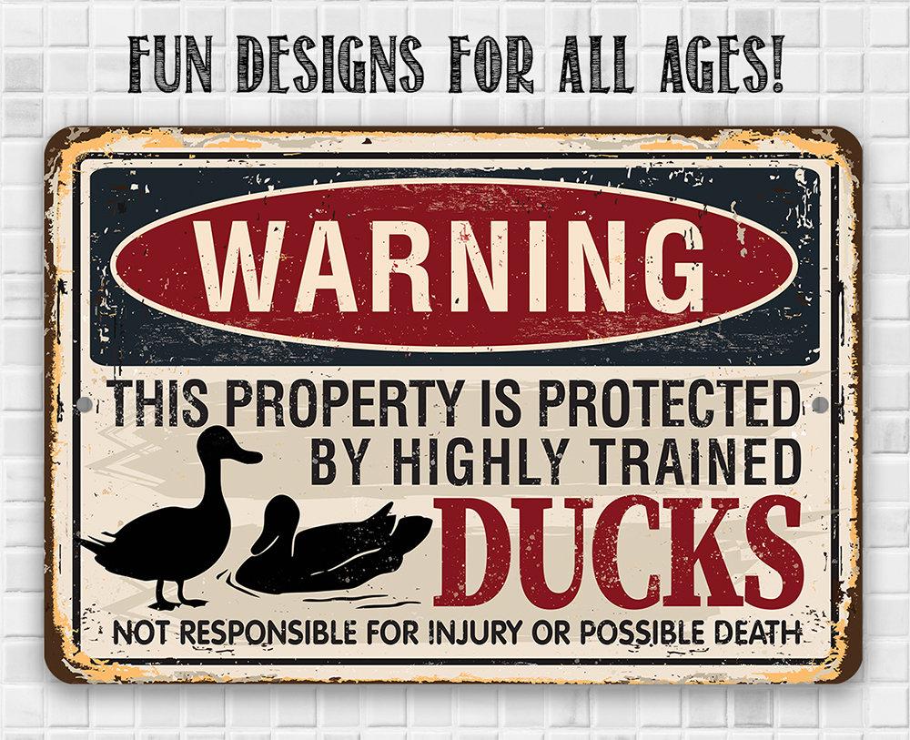 Warning Property Ducks - Metal Sign | Lone Star Art.