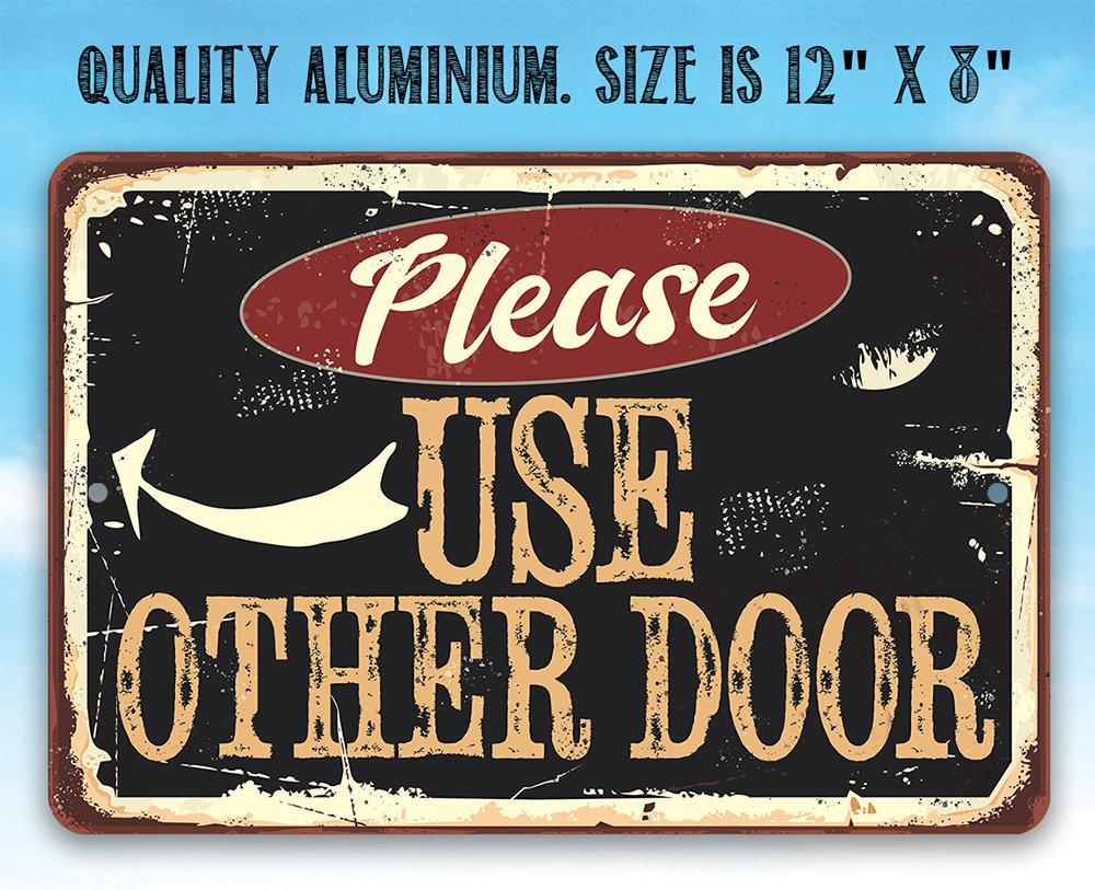 Please Use Other Door Pointing - Metal Sign | Lone Star Art.